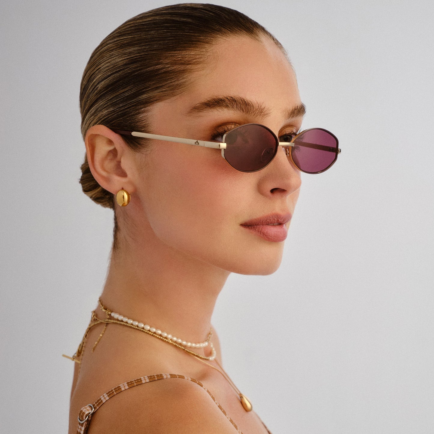 Objective Gold Burgundy Mono Female Oval Sunglasses | Aire