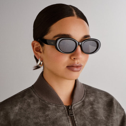 Epsilon Black Female Oval Sunglasses | Aire