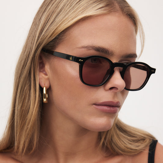 Nyxis Black Uni-Sex Round Sunglasses | Aire