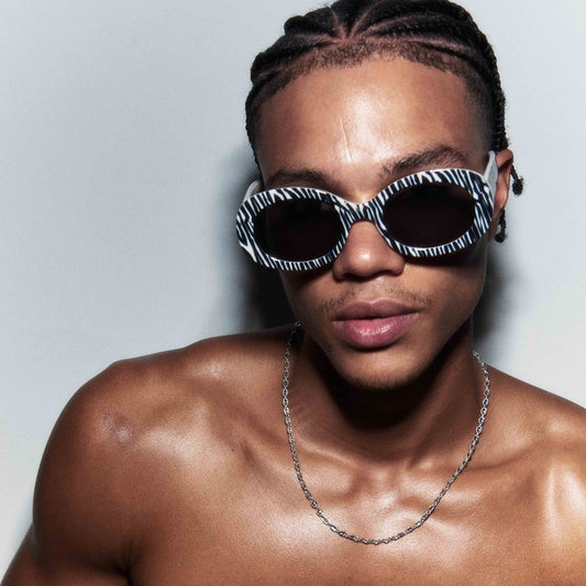 Dazed Zebra Vintage White Female Oval Sunglasses | Aire