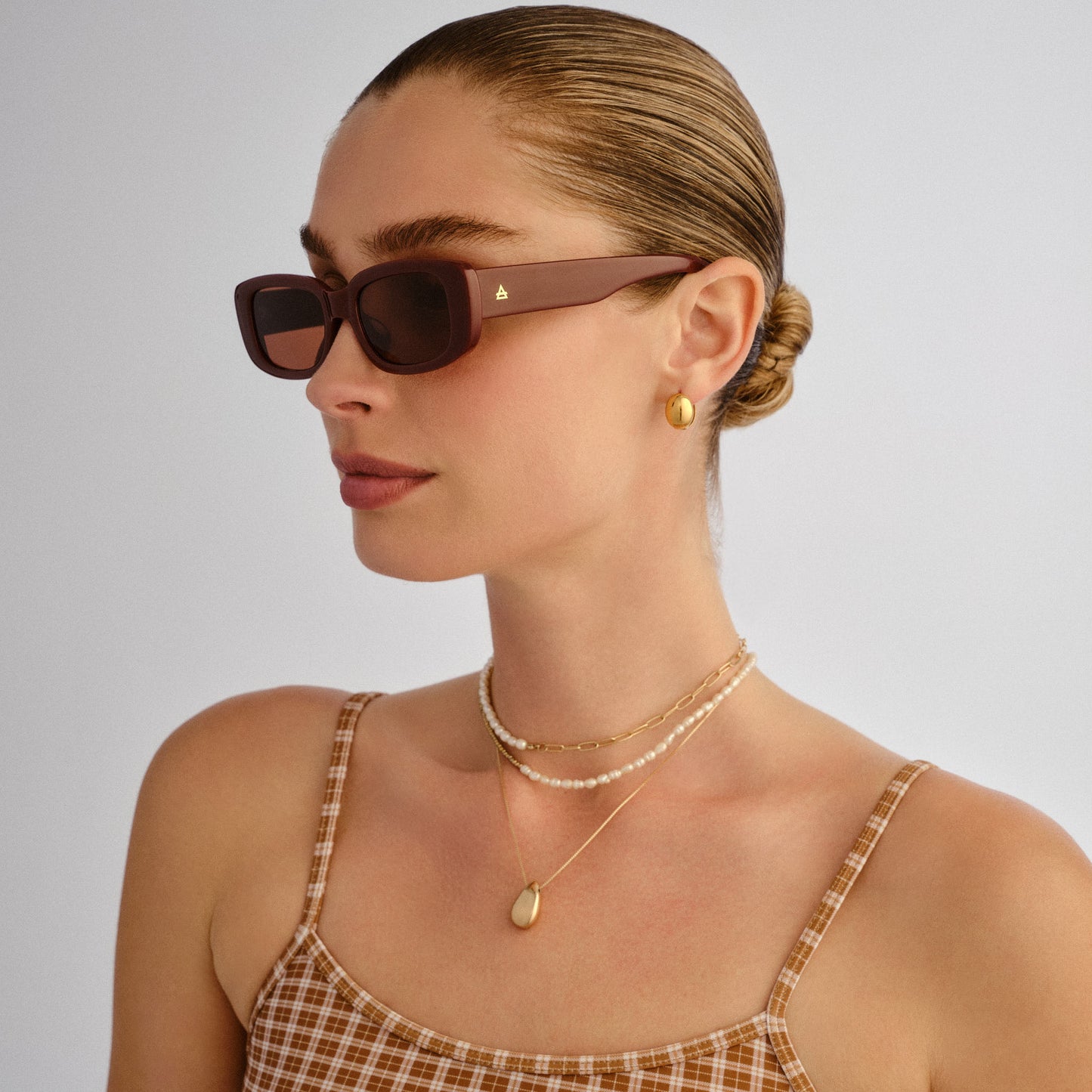 Ceres Burgundy Female Rectangle Sunglasses | Aire