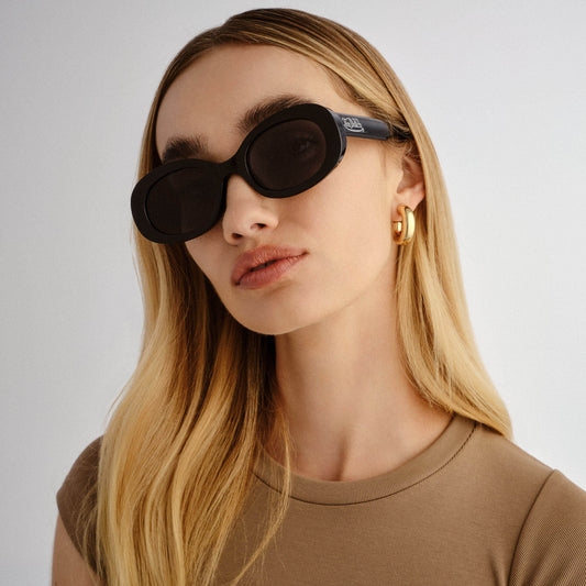 Dazed Black Female Oval Sunglasses | Aire