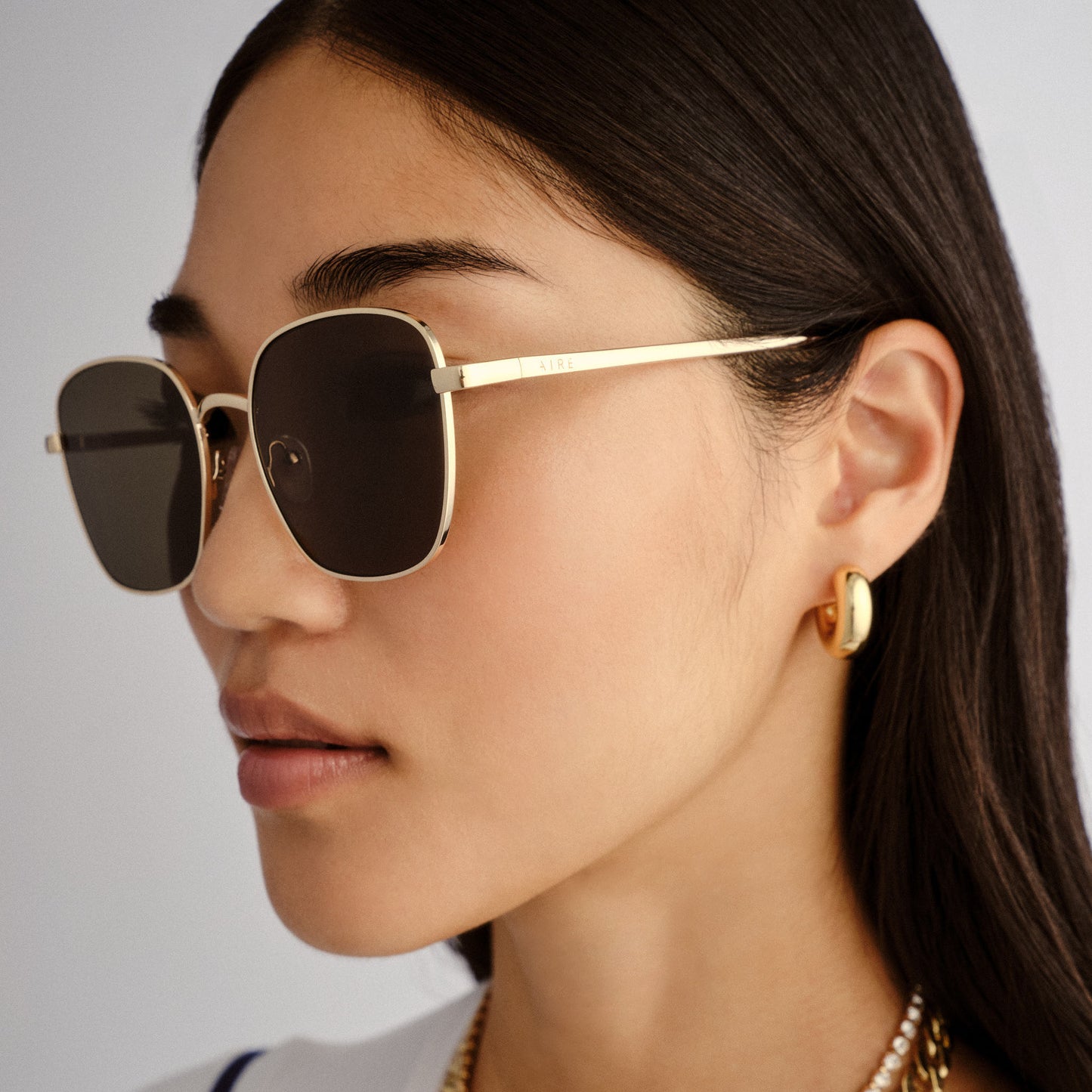 Spiral Gold Female Square Sunglasses | Aire