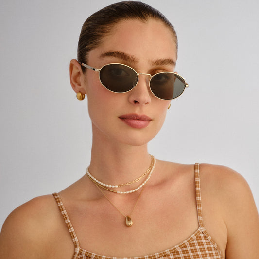 Ephermeris Gold Uni-Sex Oval Sunglasses | Aire