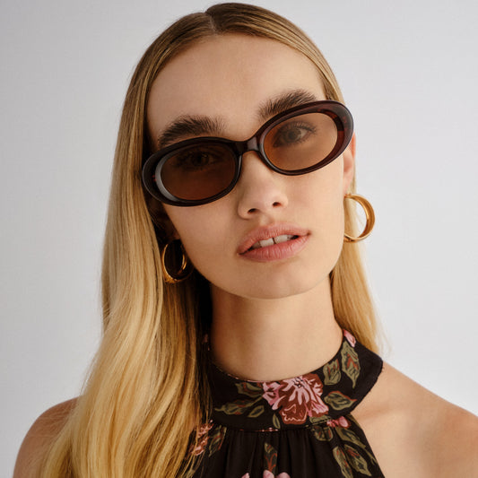 Epsilon Chocolate Female Oval Sunglasses | Aire