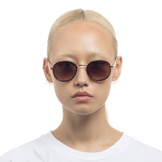 Cygnus Syrup Tort Uni-Sex Round Sunglasses | Aire