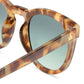 Evolution Dark Tort Female Round Sunglasses | Aire