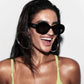 Dazed Black Female Oval Sunglasses | Aire