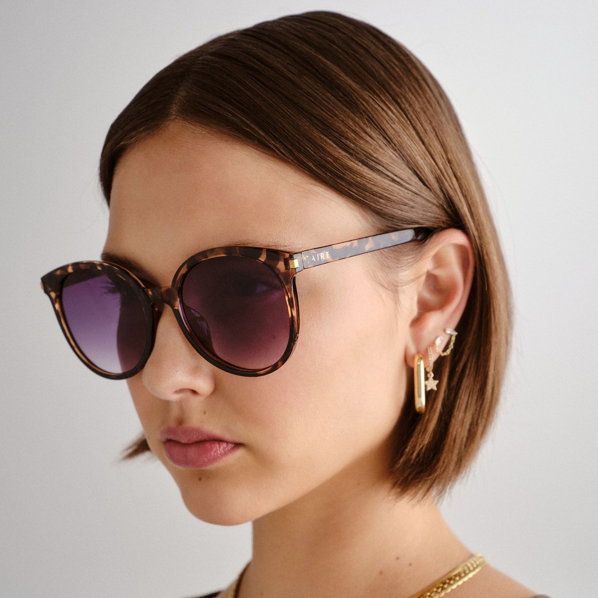 Lyrasphere Charcoal Tort Female Round Sunglasses | Aire