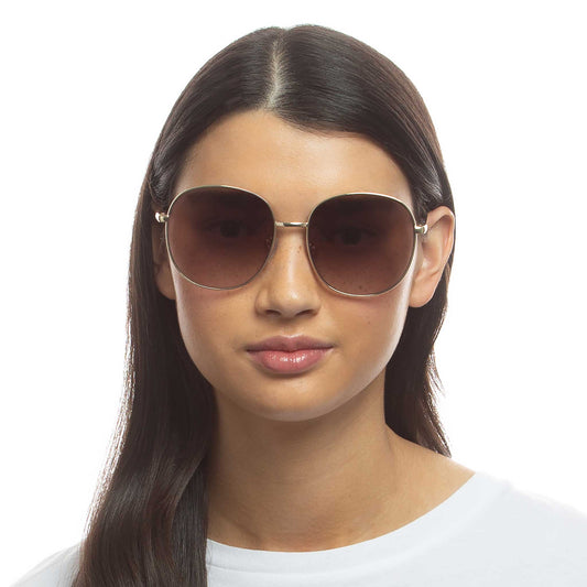 Atria Gold Female Round Sunglasses | Aire