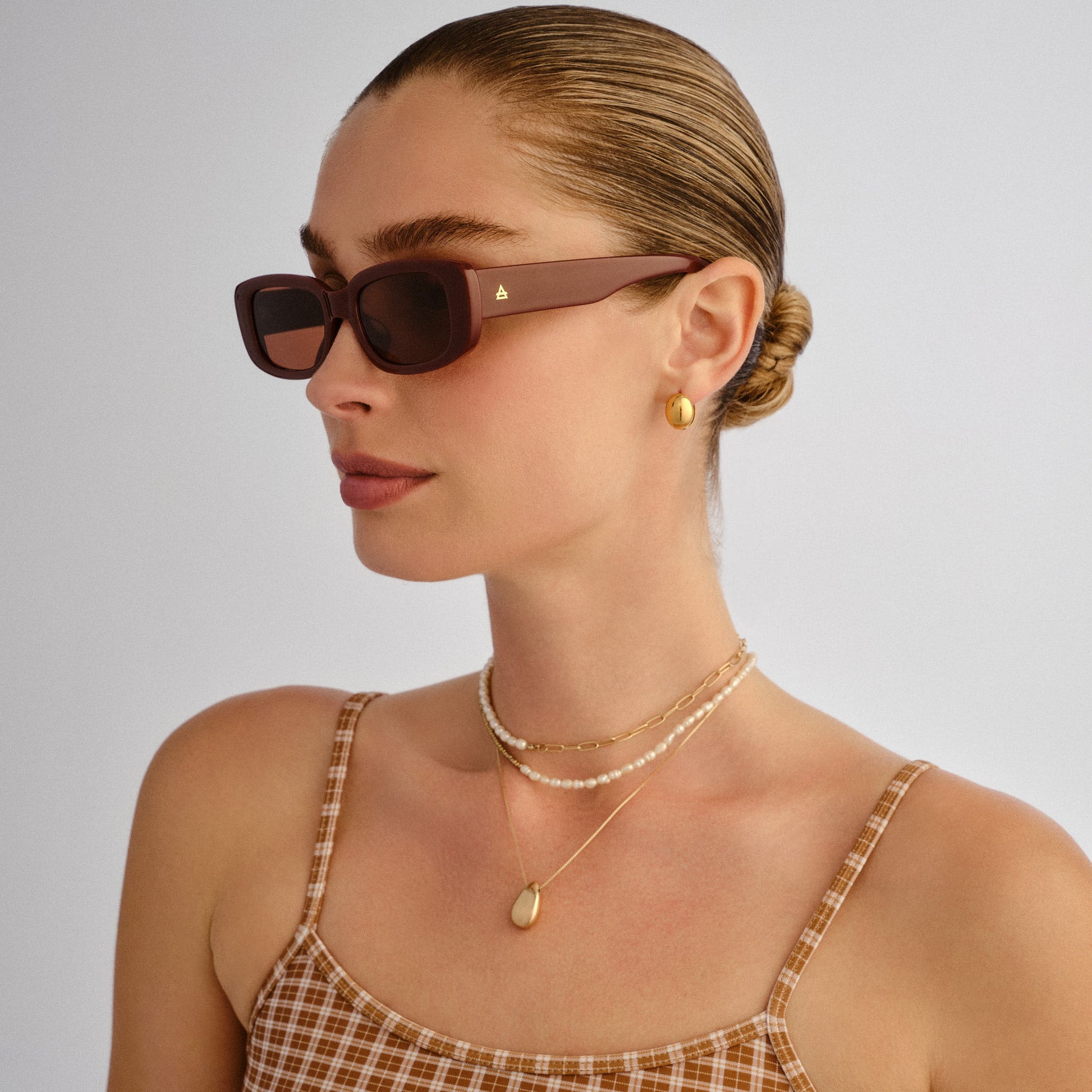 Ceres Burgundy Female Rectangle Sunglasses | Aire