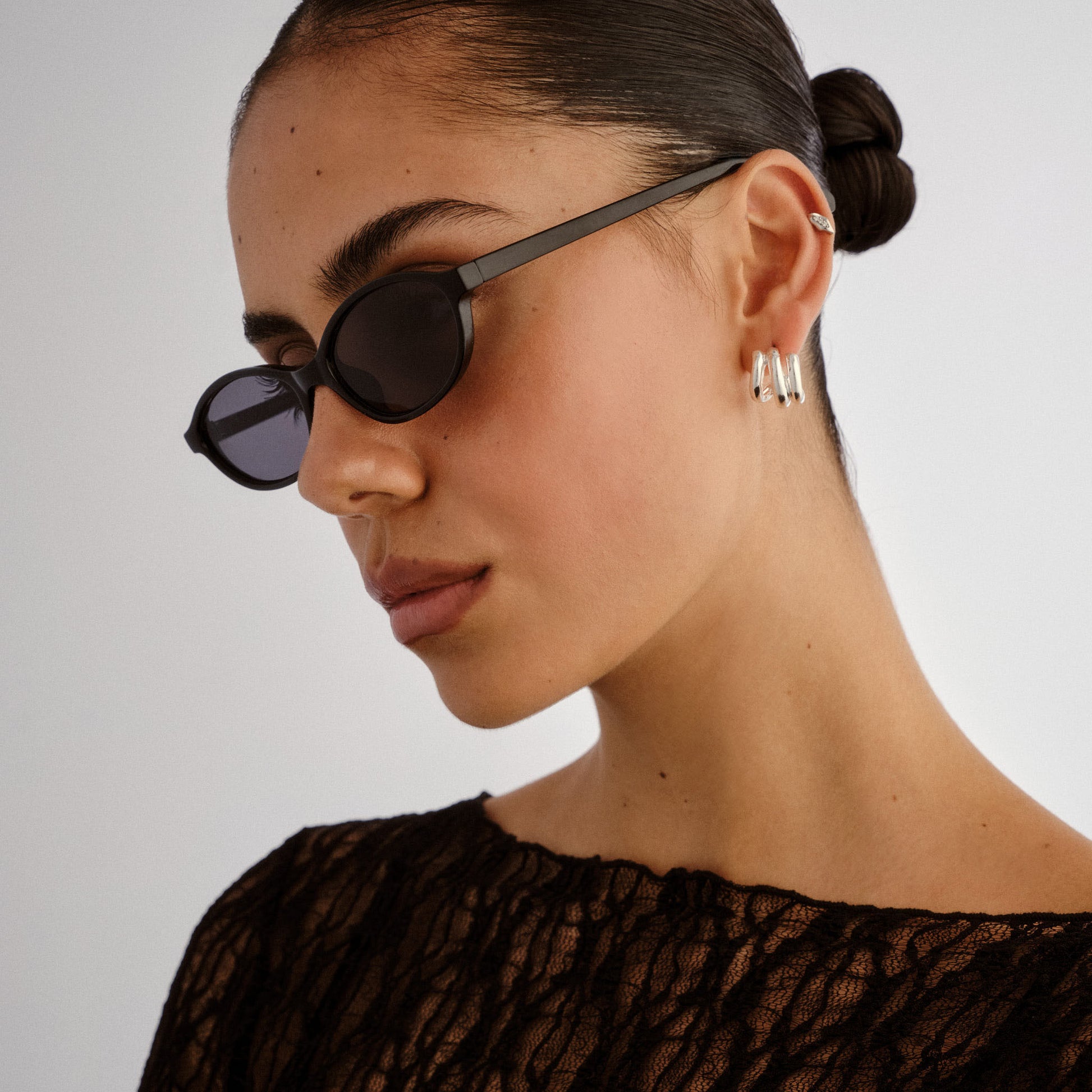Earthshine Black Female Oval Sunglasses | Aire