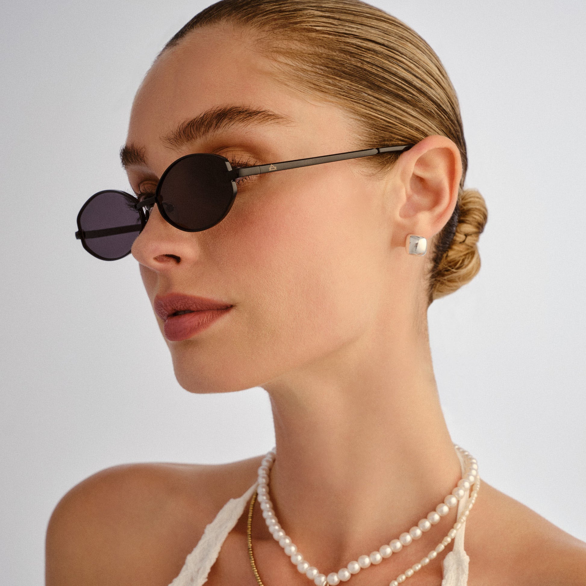AIRE Objective Sunglasses in Black
