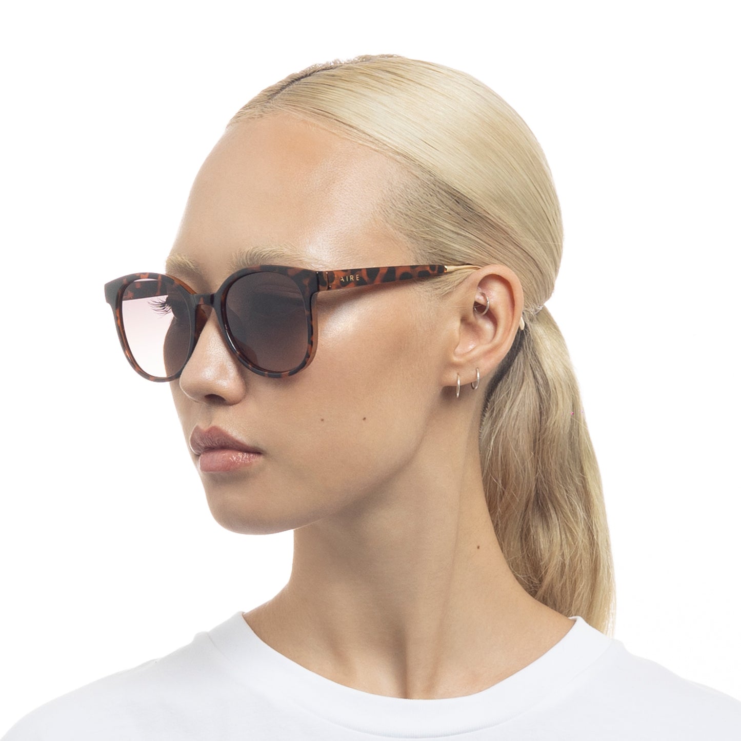 Crux Dark Tort Female Round Sunglasses | Aire